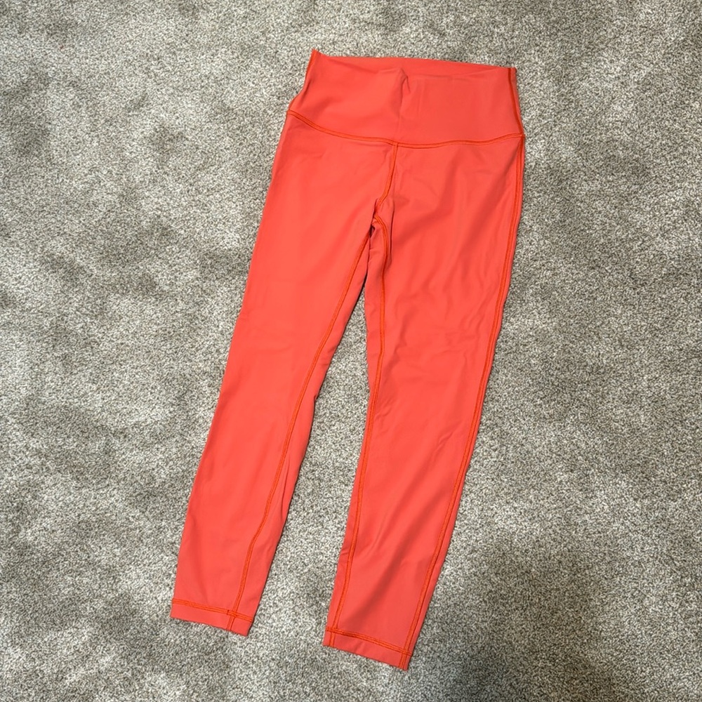 Orange lululemon leggings size 8 25 inch